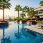 Luxurious outdoor swimming pool with lush landscaping in Dubai